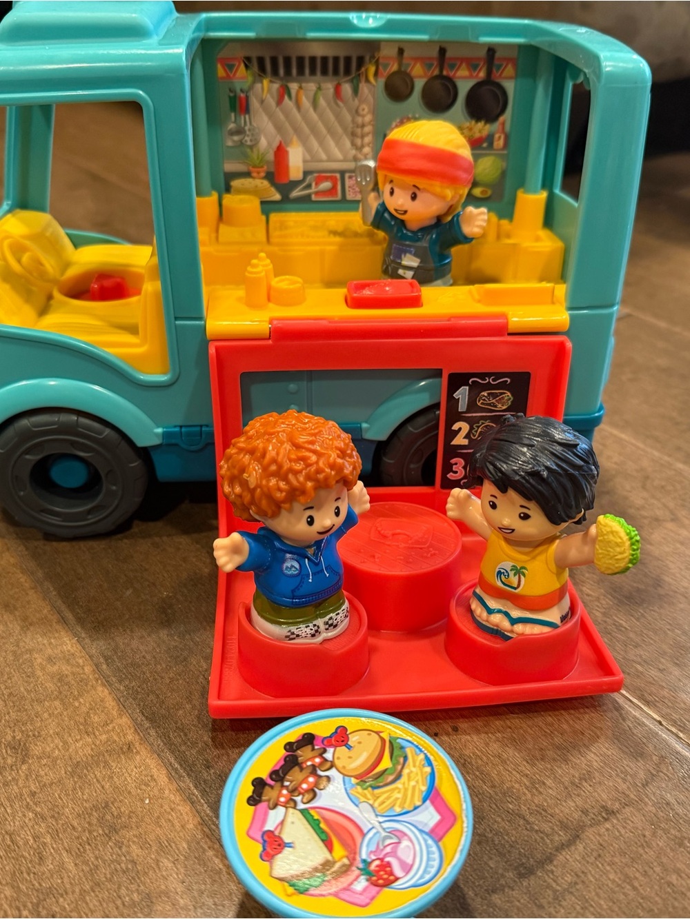 Fisher-Price Teal and Yellow Kids Food Truck Playset with Red Serving Counter